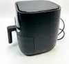 A black air fryer is shown against a white background. Anteprima dell’immagine prodotto