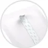 A close-up view of a white product with a strip of blue and white patterned tape peeling off. Podgląd zdjęcia produktu