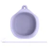 A top-down view of a purple silicone case for wireless earbuds, with a separate purple lanyard. Náhľad obrázku produktu