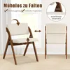 A folding chair is shown in two states: unfolded and folded, with arrows indicating movement and text highlighting features. Voir les images du produit