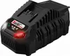 A close-up of a black battery charger with red and green indicator lights. Produktbild-Vorschau