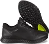 A pair of black leather sneakers with black soles and a bright yellow accent on the sole of one shoe. One shoe is shown from the side, and the other is shown from the bottom. Podgląd zdjęcia produktu