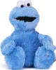 A plush toy of the Sesame Street character Cookie Monster is sitting down against a white background. Produktbild-Vorschau