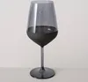 A dark gray wine glass with a matte black base and stem, set against a plain background. Náhled obrázku produktu