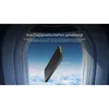 A power bank is shown floating in the sky, viewed through an airplane window. Náhled obrázku produktu