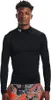 A man wearing a black long-sleeved shirt and patterned shorts, posing for a product shot. Produktbild-Vorschau