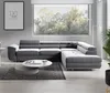 A modern living room with a large sectional sofa, coffee table, and a large window overlooking trees. Produktbild-Vorschau