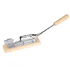 A mechanical nutcracker with a wooden base and handle, shown against a white background. Voir les images du produit