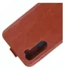 A close-up view of a brown leather flip case for a smartphone, showing the stitching and a cutout for the camera. Produktbild-Vorschau