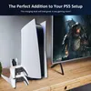 A PS5 console and controllers are displayed on a wooden desk next to a TV screen showing a video game. Produktbild-Vorschau