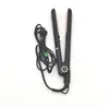 A black hair straightener with gold accents and its power cord is laid out on a white background. Náhľad obrázku produktu