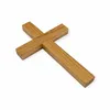 A wooden cross is shown against a white background. Podgląd zdjęcia produktu