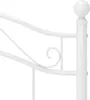 A close-up of a white metal bed frame. Náhľad obrázku produktu