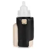 A baby bottle with a black and cream holder, on a white background. Produktbild-Vorschau