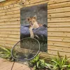 Gartenposter - 80x120 cm - Löwenjunges auf dem Stamm Produktbild-Vorschau 7