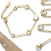Camerazar Bracciale d'oro in acciaio chirurgico con fiore Anteprima dell’immagine prodotto 2