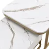 A close-up view of two nested tables with a marble-like pattern. Voir les images du produit