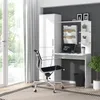 A white desk with a laptop, chair, and storage unit in a room with a window. Produktbild-Vorschau