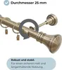 Close-up of a curtain rod with rings and a decorative end piece, with text overlays highlighting features. Produktbild-Vorschau