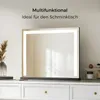 A lighted makeup mirror is placed on a white dresser, with decorative items on the right and a vase with dried flowers on the left. Podgląd zdjęcia produktu