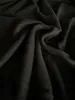 A close-up shot of black fabric, likely a fitted sheet, with folds and creases. Produktbild-Vorschau