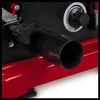 A close-up view of a black nozzle attached to a red machine. Produktbild-Vorschau
