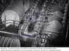 Inside of a dishwasher with dishes and cups being cleaned. Produktbild-Vorschau