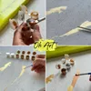 A collage of images showing a paint-by-numbers kit for adults, with close-ups of the paints, brushes, and the canvas being painted. Produktbild-Vorschau
