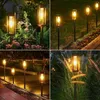 A collage of four images showing solar garden lights in various outdoor settings at dusk and night. Produktbild-Vorschau