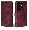 A burgundy flip case for a smartphone is shown from two angles, open and closed. Produktbild-Vorschau
