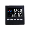 A black digital alarm clock with a digital display showing the time, date, temperature, and humidity. Produktbild-Vorschau