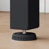 Close-up of the adjustable foot of a black table leg on a wooden floor. Náhled obrázku produktu
