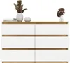 A white and wood dresser with decorative items on top. Anteprima dell’immagine prodotto