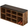 A shoe rack bench with a padded top, showing a pair of brown shoes in one of the compartments. Anteprima dell’immagine prodotto