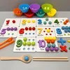 A Montessori learning set for counting and sorting, featuring colorful number cards and matching colored balls. Produktbild-Vorschau