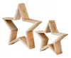 Two wooden star-shaped decorations are shown against a white background. Produktbild-Vorschau