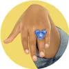 A close-up of a hand wearing a blue, glittery Mickey Mouse ring. Voir les images du produit