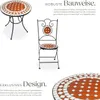 A mosaic garden set with a table and chair, presented with descriptive text highlighting its features. Náhled obrázku produktu