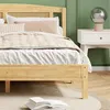 A bedroom scene with a bed, nightstand, and lamp. Produktbild-Vorschau