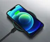 A smartphone is wirelessly charging on a charging pad. Anteprima dell’immagine prodotto