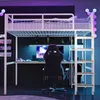 A loft bed with a desk and shelves underneath, set up in a gaming room with colorful lighting. Náhled obrázku produktu