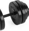 A close-up, studio shot of a black dumbbell on a white background. Náhled obrázku produktu