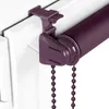 A close-up view of a purple roller blind mechanism attached to a white window frame. Produktbild-Vorschau