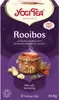 A box of Yogi Tea Rooibos tea with illustrations of ingredients. Produktbild-Vorschau