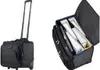 A black business notebook trolley is shown from two angles: one showing the exterior with the handle extended, and the other showing the interior with files and folders. Produktbild-Vorschau