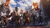 A group of orcs and a troll marching forward with banners in a mountainous, rocky terrain. Produktbild-Vorschau