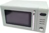 A retro-style green microwave oven is shown against a white background. Náhľad obrázku produktu
