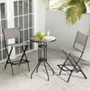 Two bar stools and a small table on an outdoor patio. Produktbild-Vorschau