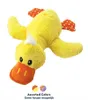 A yellow plush duck toy lying on its back against a white background. Produktbild-Vorschau