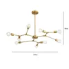 A brass-colored chandelier with multiple arms and exposed bulbs, shown against a white background with dimension lines. Produktbild-Vorschau